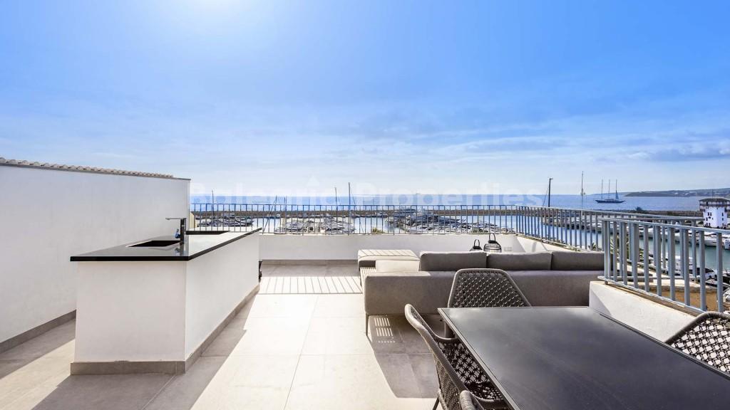 Sunny apartment with big terrace and dream views for sale in Puerto Portals, Mallorca