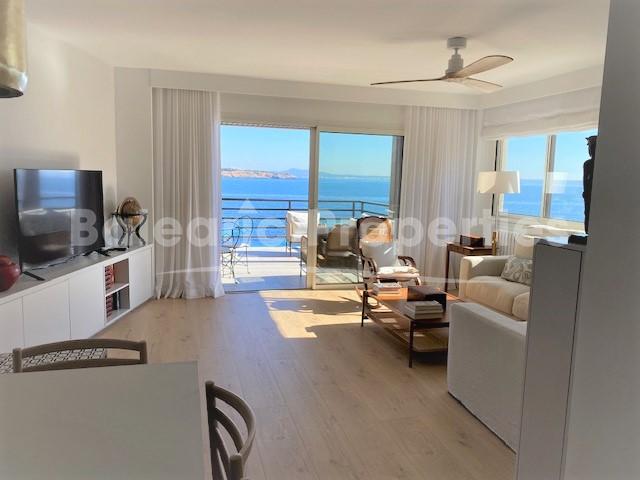 Incredible front line apartment for sale with direct sea access in Cas Catala, Mallorca