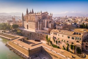 Aerial view of La Seu Cathedral during golden hour.