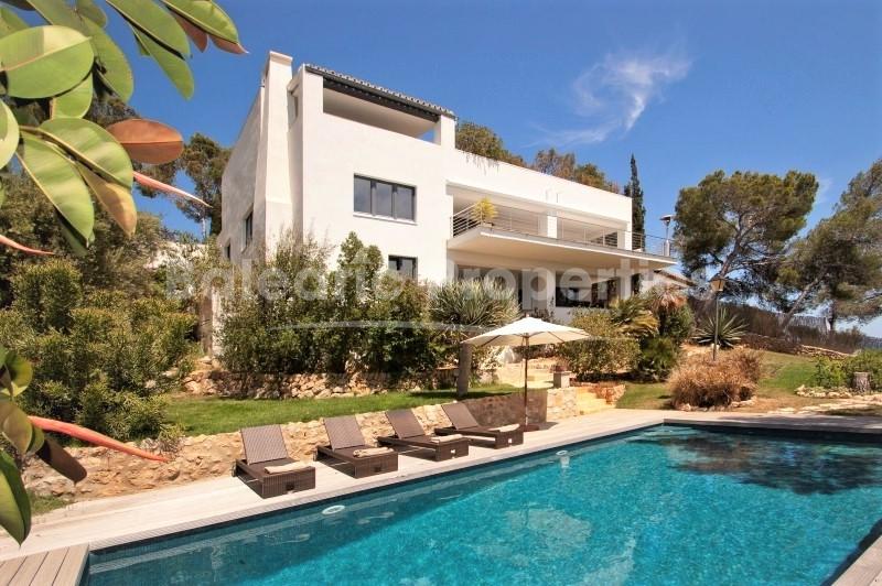 Villa con apartamento de invitados y solar adyacente en venta en Costa d'en Blanes, Mallorca