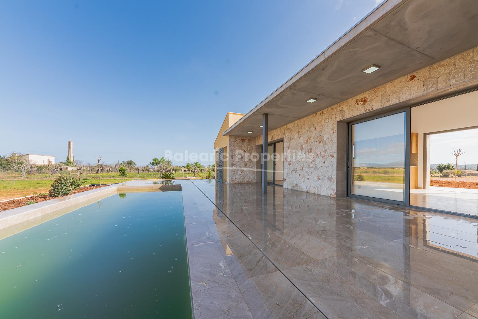 Moderna casa de campo con vistas panorámicas en venta en Llubí, Mallorca