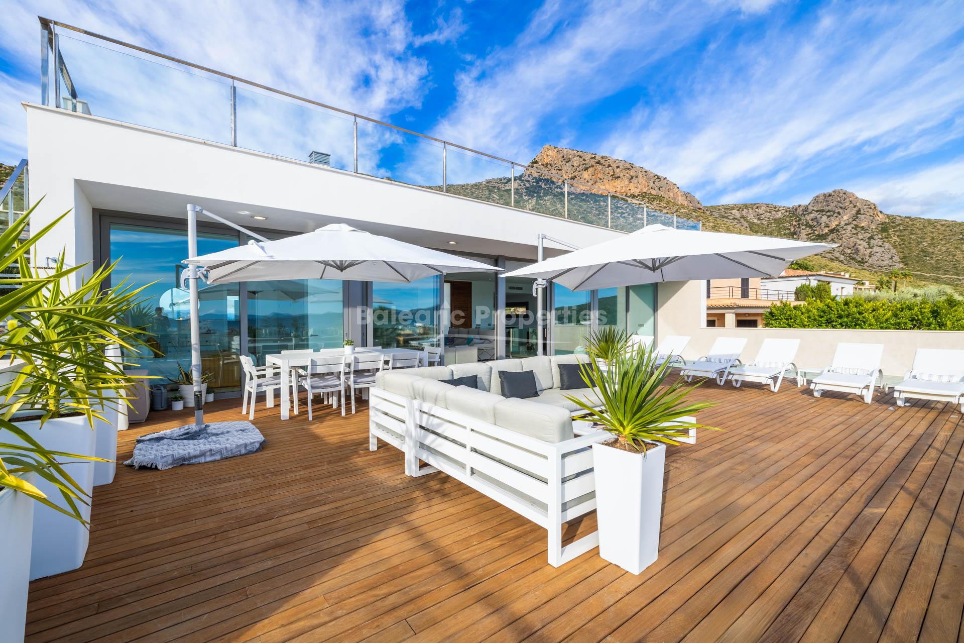 Modern luxury villa with indoor and outdoor pool, open sea views for sale in Puerto Pollensa, Mallorca