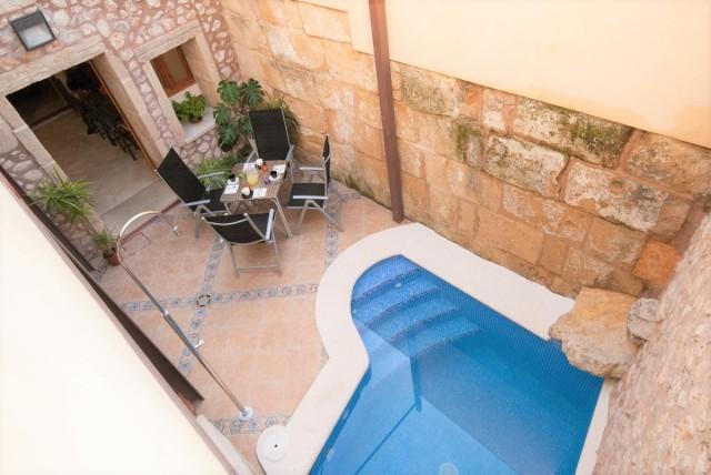 Totally renovated town house with ETV & pool for sale in Pollensa, Mallorca