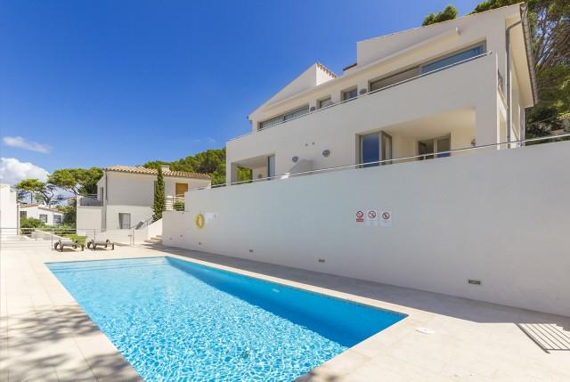 Ideal duplex home with holiday rental license for sale in Cala Sant Vicente, Mallorca