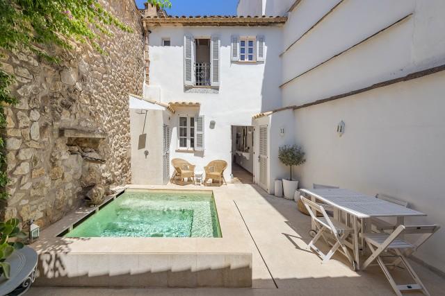 Renovated village house with holiday rental license for sale in Pollensa, Mallorca