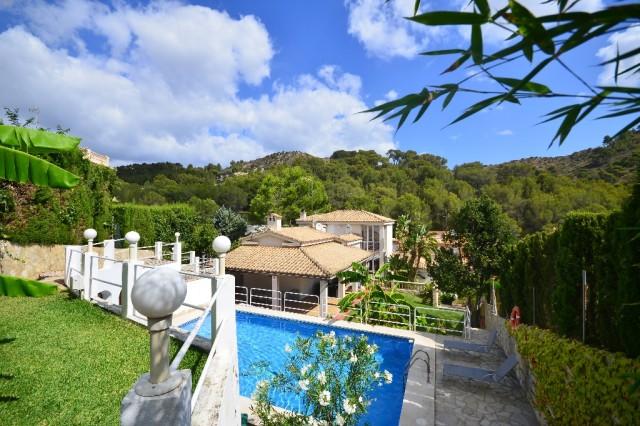 Spacious villa with lovely garden for sale in Alcanada, Alcudia, Mallorca