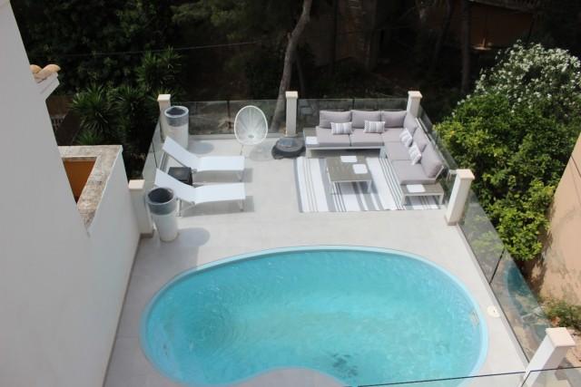 Moderno townhouse con jardín y piscina privados a la venta en Costa den Blanes, Mallorca