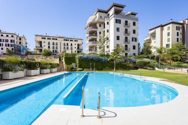 Ground floor apartment with private garden and community pools for sale in Palma, Mallorca