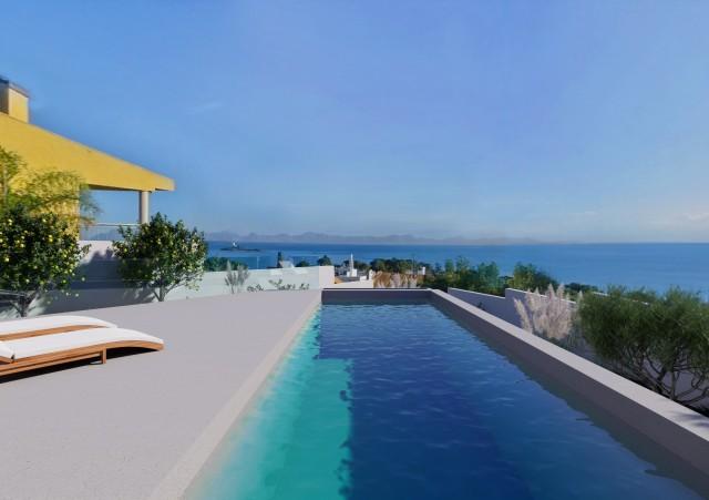 Sea view plot with project and building license for sale in Alcudia, Mallorca
