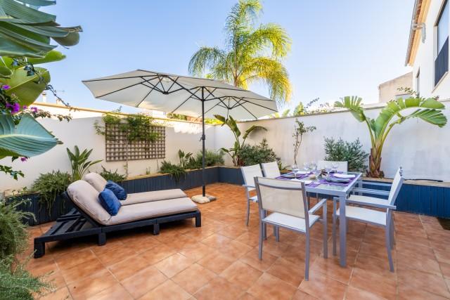 Townhouse with sunny roof top terrace for sale in the heart of Ses Salines, Mallorca