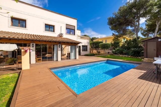 Family home with private garden and pool for sale in Port Adriano, Mallorca