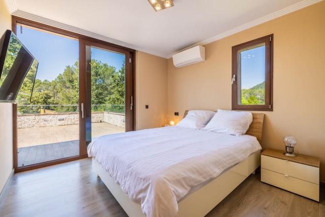 Luxurious natural stone corner villa for sale near Pollensa, North Mallorca