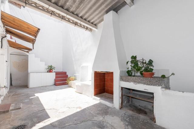 Town house with character and potential for sale in central Pollensa, North Mallorca