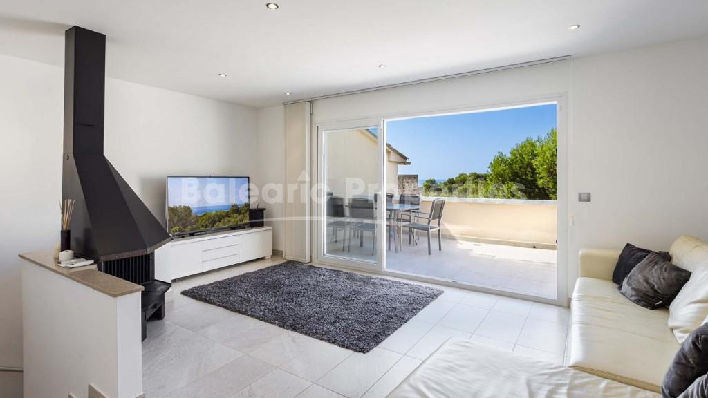 Casa adosada renovada con vistas al mar en venta en Costa den Blanes, Mallorca