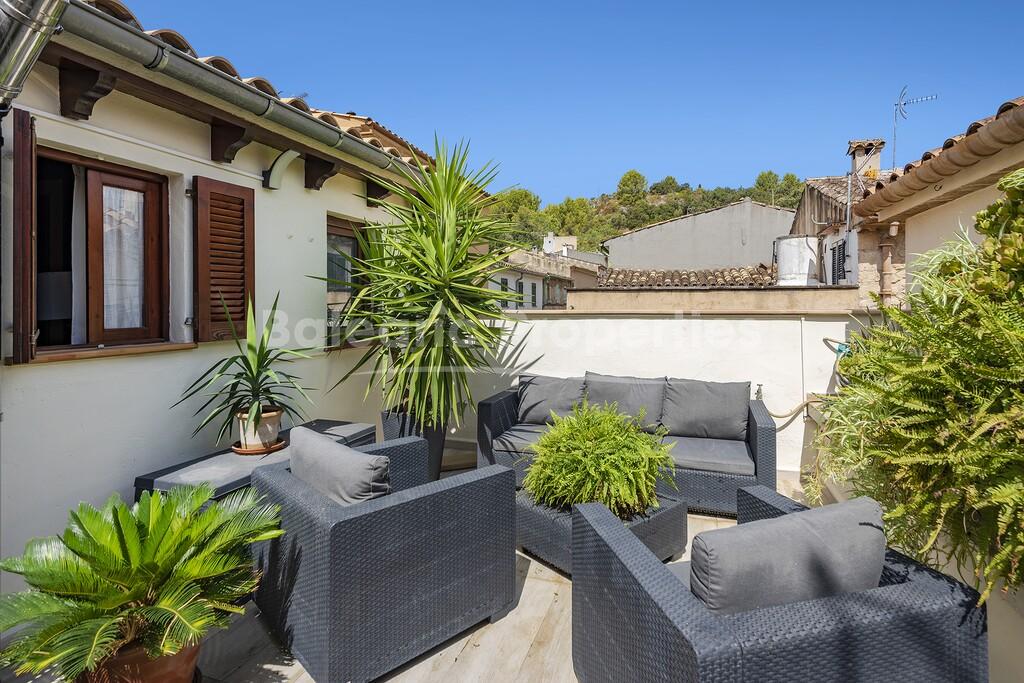 Town house with traditional stone façade for sale in the centre of Pollensa, Mallorca