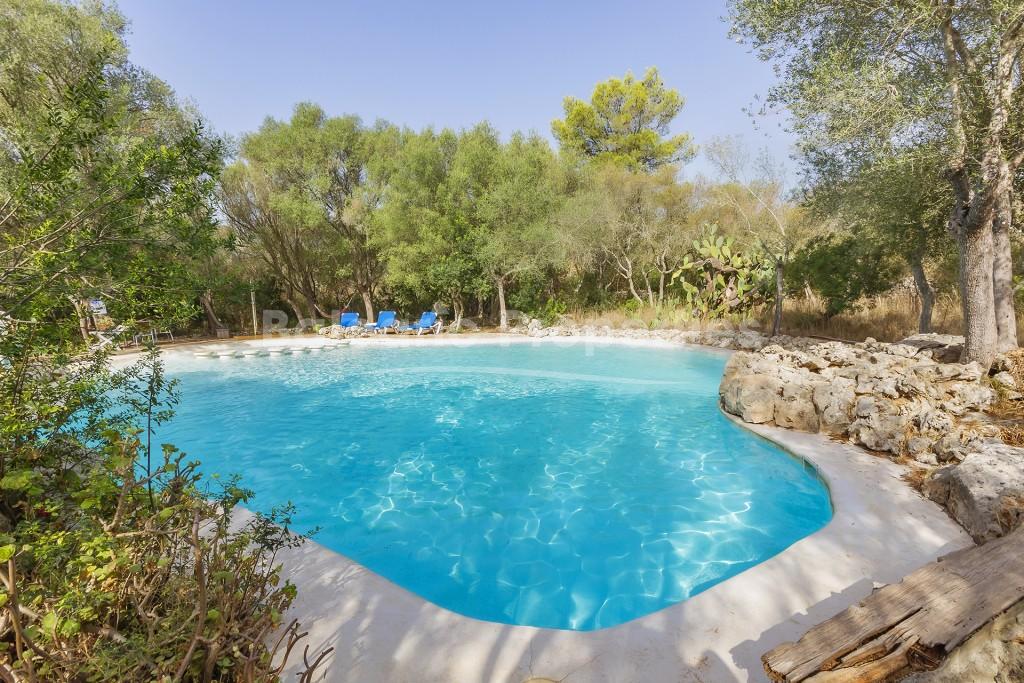 Charming hotel in a late 19th century farmhouse for sale in Llubi, Mallorca 