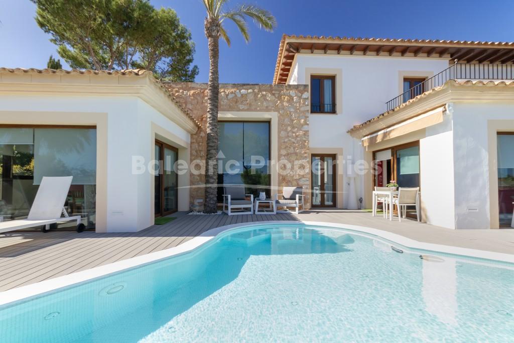 Elegante villa con vistas al mar en venta cerca de la playa en Cala Vinyes, Mallorca 