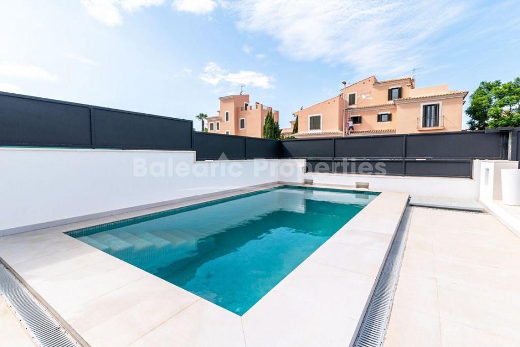 Moderna casa adosada con piscina en venta en Puig de Ros, Mallorca