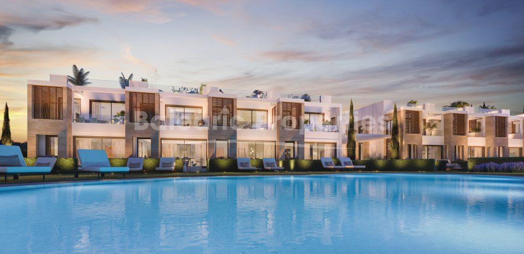 Mid terrace houses for sale near the beach in Puerto Alcudia, Mallorca