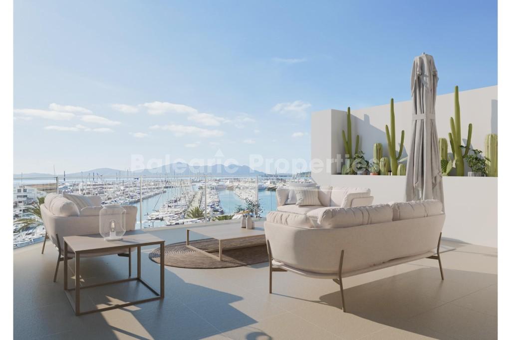 Front line penthouse with roof terrace for sale in Puerto Pollensa, Mallorca