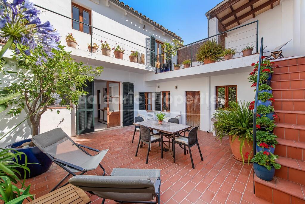 Charming town house with patio oasis for sale in Pollensa, north Mallorca