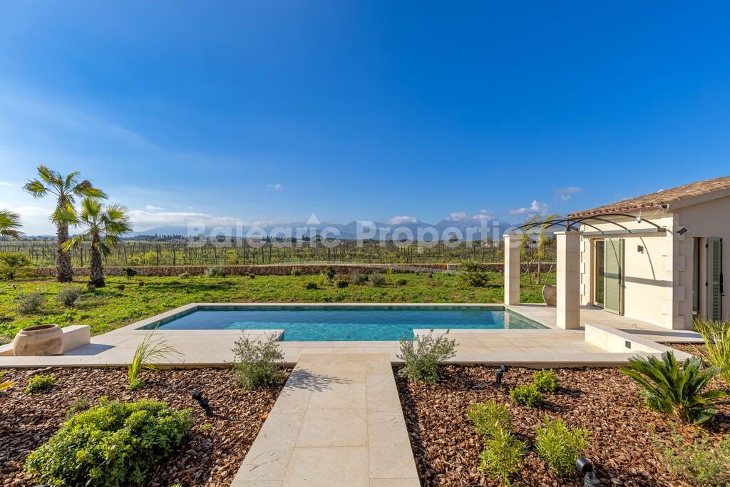 Neu erbaute Finca mit Weinberg kaufen in der Nähe von Binissalem, Zentral-Mallorca
