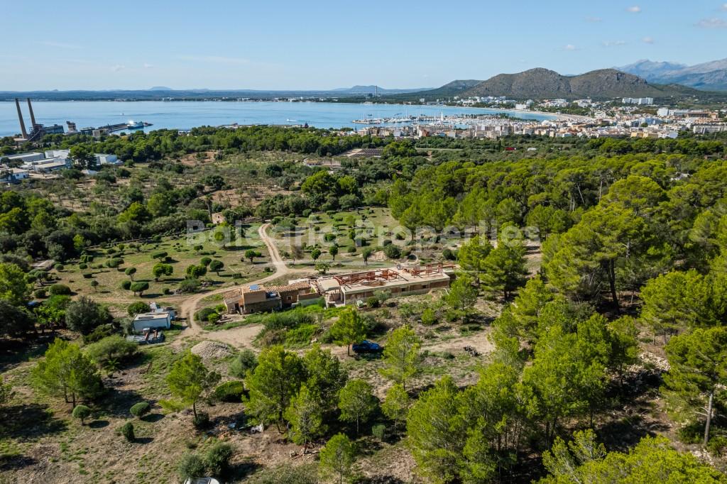 Sea view plot with unfinished house for sale in Alcudia, North Mallorca