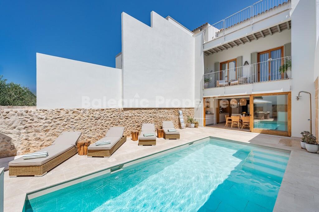 Elegantly renovated village house with pool for sale in Pollensa, North Mallorca