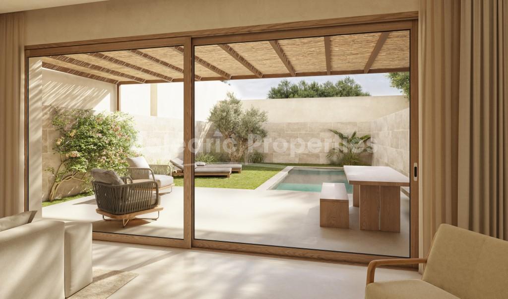 Encantadora casa adosada en venta en el corazón de Santanyí, sureste de Mallorca