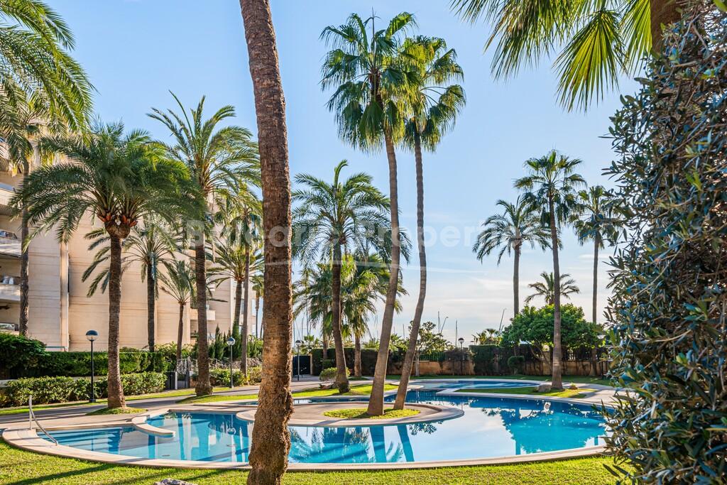 Frontline duplex apartment with private garden for sale in Palma, Mallorca