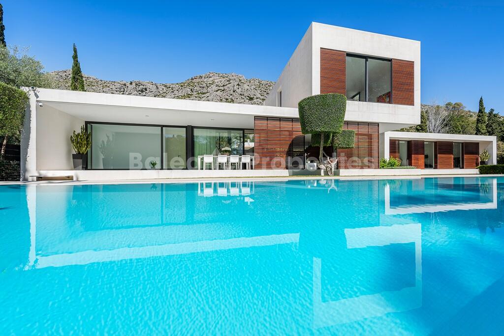 Modern luxury villa with tennis court for sale in Pollensa, North Mallorca