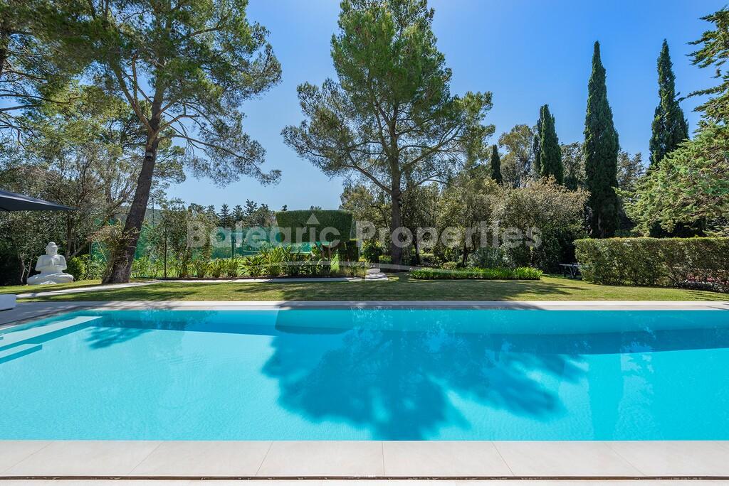 Modern luxury villa with tennis court for sale in Pollensa, North Mallorca