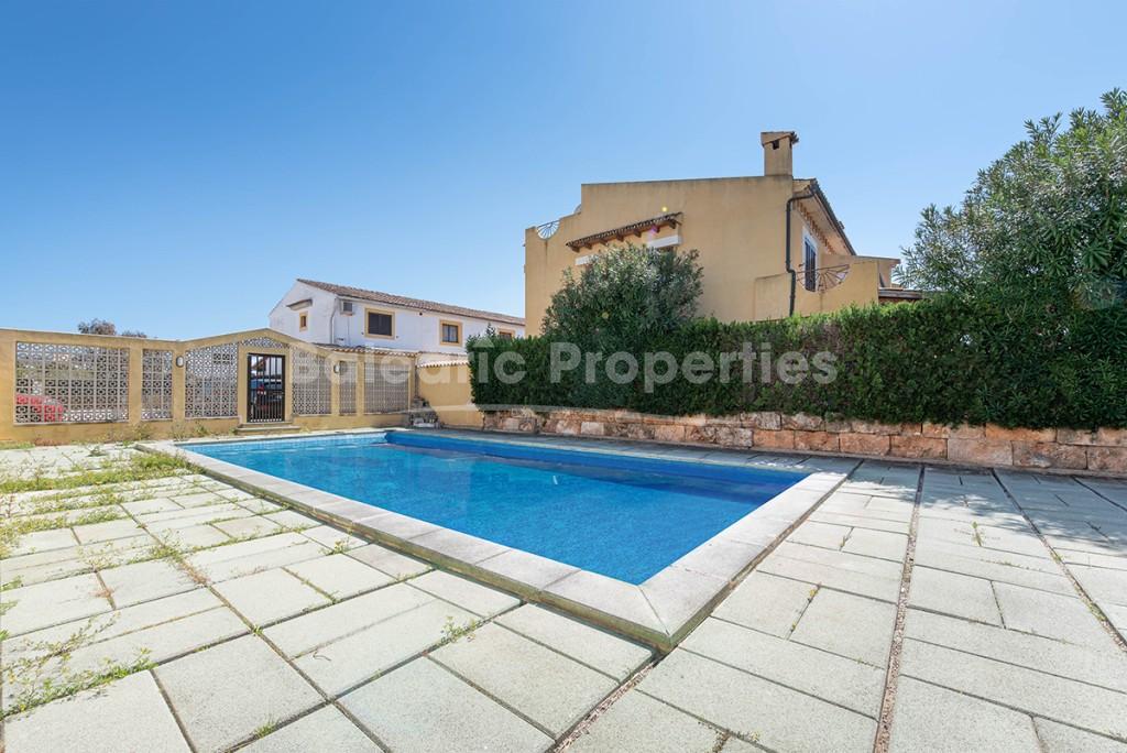 Semi-detached house with community pool for sale in Puerto Alcudia, Mallorca
