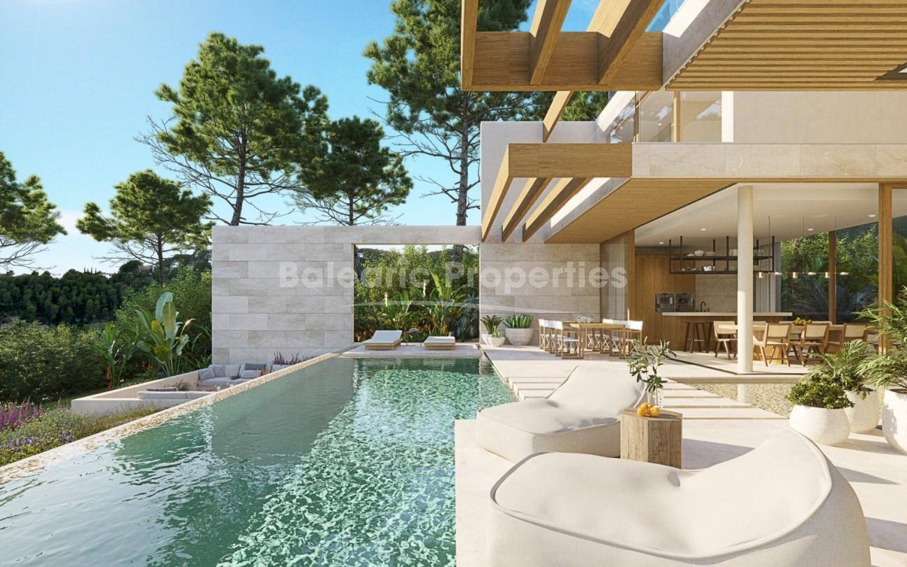 Moderna villa de estilo Mediterráneo con vistas sobre la cala Cap Falcó en venta en Cala Vinyas, Mallorca